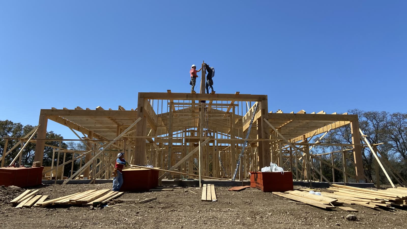 Gartex crew working on a wood frame structure